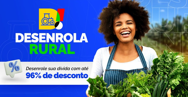 Mulher sorridente segurando uma cesta de vegetais ao lado da mensagem do Desenrola Rural, programa de renegociação de dívidas com descontos de até 96%.