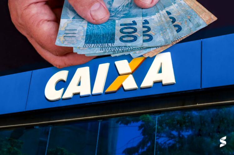 Mãos segurando cédulas de 100 reais na frente de uma agência da CAIXA, símbolo de benefício que começa a ser liberado esta semana.