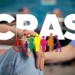 Mãos dadas simbolizando apoio do CRAS, com ícones coloridos representando inclusão social.