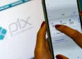 Tela de celular mostrando opções do Pix para pagar compras e ler QR Code