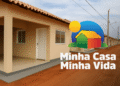 Imagem de casas do programa Minha Casa Minha Vida Rural com logo e texto sobre o contrato para 170 moradias.