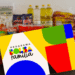 Cartão do Bolsa Família com alimentos ao fundo.