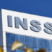 Fachada do prédio com a logo do INSS em destaque.