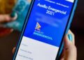 Tela do aplicativo Auxílio Emergencial 2021 com informações sobre o programa.