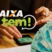Mãos sobre celular com logo da Caixa e a frase "Caixa Tem!", ao lado de notas de 100 reais, ilustrando o Pix premiado.